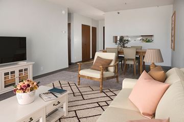 St. Paul apartment for rent - a living room and dining room with a couch and a table