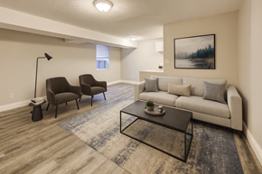 Hamilton apartment for rent - A living room with a couch, chairs, and a coffee table.