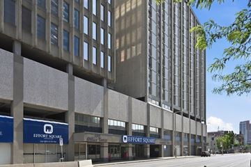 Hamilton apartment for rent - A large building with a sign that says Effort Square.