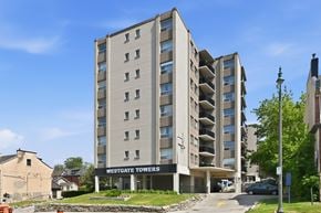 Hamilton apartment for rent - A large building with the name Westgate Towers on it.