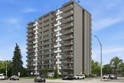 Hamilton apartment for rent - A tall residential building with cars parked in front.