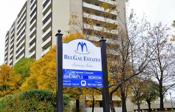 Hamilton apartment for rent - A sign for Belgal Estates is displayed in front of a building.