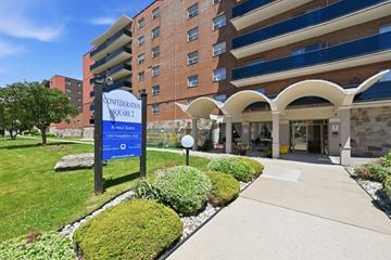 Hamilton apartment for rent - A blue sign with Confederation Square 2 written on it.