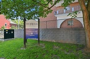 Hamilton apartment for rent - A sign for Brockton is in front of a brick building.
