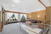 Hamilton apartment for rent - A living room with a couch, chairs, and a coffee table.