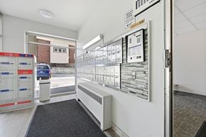 Hamilton apartment for rent - A control panel room with a grey carpet on the floor.
