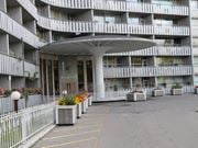 Hamilton apartment for rent - A white building with a white fence and a white canopy.