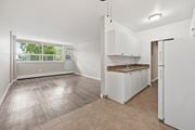Hamilton apartment for rent - A kitchen with white cabinets and a countertop is shown.