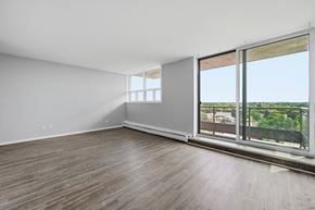 Hamilton apartment for rent - A room with a sliding glass door leading to a balcony.