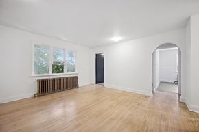 Kitchener apartment for rent - A room with a window and a radiator on the wall.