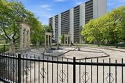 Hamilton apartment for rent - A black fence with a decorative design surrounds a circular courtyard.