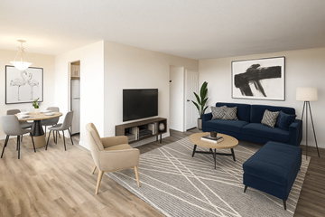 St. Catharines apartment for rent - A living room with a blue couch and a television.