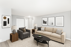 Hamilton apartment for rent - A living room with a couch, armchair, and coffee table.
