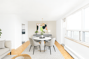 Hamilton apartment for rent - A dining room with a white table and chairs.