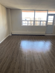 Hamilton apartment for rent - A room with a window and a door.