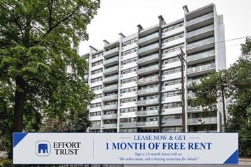 Hamilton apartment for rent - A large building with a sign in front that says "Effort Trust 1 Month of Free Rent".