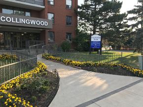 Stoney Creek apartment for rent - Collingwood building with a sign in front of it.