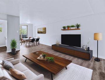 Hamilton apartment for rent - A modern living room with a wooden coffee table and a flat screen TV.