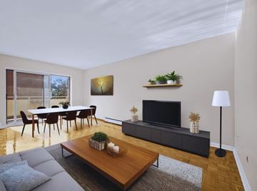 Hamilton apartment for rent - A modern living room with a wooden coffee table and grey sofa.