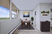 Hamilton apartment for rent - A dining room with a table and chairs and a painting on the wall.