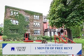Hamilton apartment for rent - A building with a sign that says "1 month of free rent".