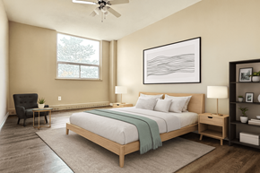 Hamilton apartment for rent - A bedroom with a large bed, a chair, and a ceiling fan.