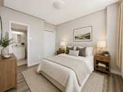Hamilton apartment for rent - A bedroom with a large bed and a painting on the wall.
