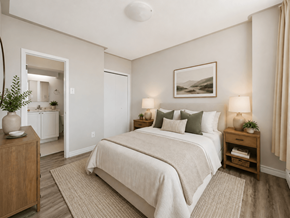 Hamilton apartment for rent - A bedroom with a large bed and a painting on the wall.