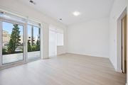 Kitchener apartment for rent - Spacious empty room with patio door access at The Maverick Apartments, Ontario