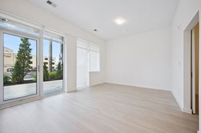 Kitchener apartment for rent - Spacious empty room with patio door access at The Maverick Apartments, Ontario