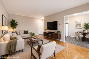 Stoney Creek apartment for rent - A living room with a couch, chair, and coffee table.