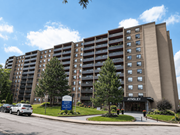 Hamilton apartment for rent - AYSLEY building with a blue signboard in front.