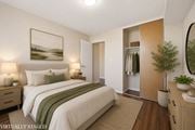 Hamilton apartment for rent - A bedroom with a bed, nightstands, and a painting on the wall.