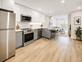 Hamilton apartment for rent - A modern kitchen with wooden floors and stainless steel appliances.