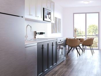 Kitchen with dark grey cabinets