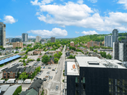 Hamilton apartment for rent - A cityscape with a mix of residential and commercial buildings.