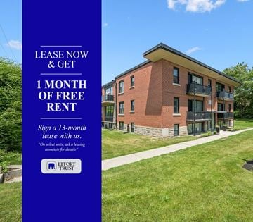 Kitchener apartment for rent - A blue and white advertisement for a 1 month free rent offer.