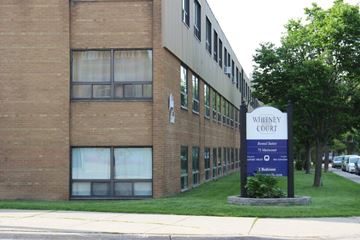 Hamilton apartment for rent - A sign in front of a building that says Whitemey Court.