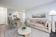 Hamilton apartment for rent - A living room with a couch, chair, and a coffee table.