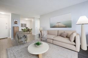 Hamilton apartment for rent - A living room with a couch, chair, and a coffee table.