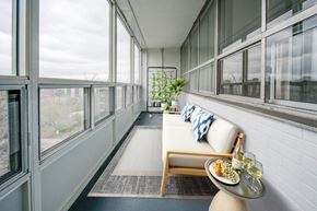 Hamilton apartment for rent - A table with food and drinks on it in front of a window.
