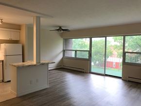 Dundas apartment for rent - A kitchen with a refrigerator, cabinets, and a countertop.