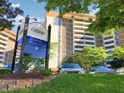 Hamilton apartment for rent - A sign for Chedoke Apartment Homes stands in front of a building.
