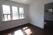 Kitchener apartment for rent - A room with a window and sunlight coming through.