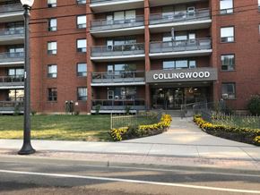 Stoney Creek apartment for rent - Collingwood apartment building with a walkway in front.