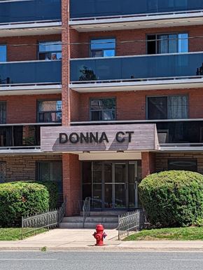 Hamilton apartment for rent - A red fire hydrant is in front of a building named Donna Court.