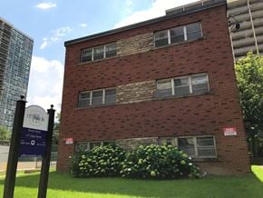 Hamilton apartment for rent - A brick building with a sign that says 117 Duke Street.