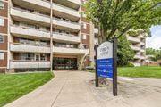 Stoney Creek apartment for rent - A sign for Evelyn Court is in front of a building.