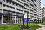 Hamilton apartment for rent - A large building with a sign in front that says "Pontiane Bleu".