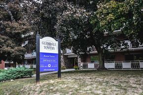 Hamilton apartment for rent - A sign for Glendale Towers stands in front of a building.